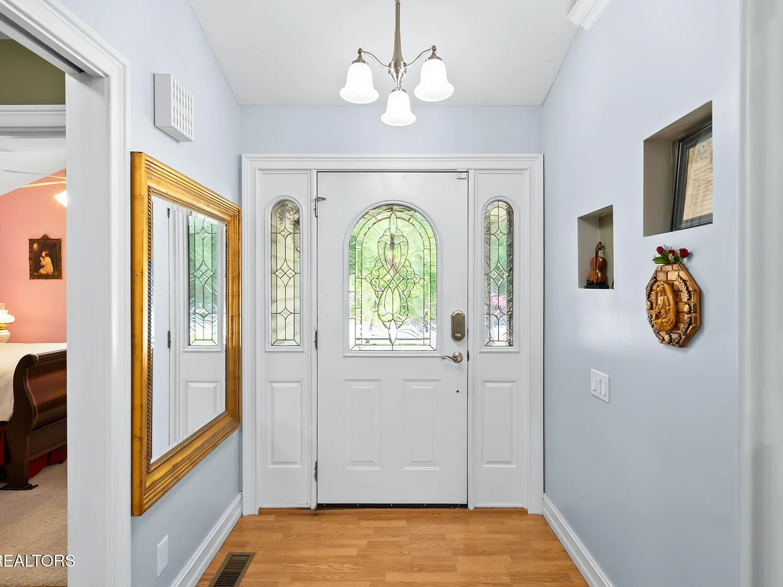 Interior view of the leaded-glass entry door